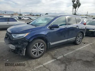 2022 Honda CR-V Touring z VIN 5J6RT6H90NL024741, wystawiony jako Copart lot #50997805 z przebiegiem 64 970 mil mil oraz Szkoda całkowita • Salvage title. Historia ofert i sprzedaży dostępna na DreamBid. Obrazek 1.
