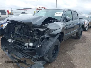 2022 Toyota Tacoma SR with VIN 3TMCZ5ANXNM483172, listed as a IAAI auction lot 42078035 with 36,088 mi miles and . Bid and sale history available at DreamBid. Image 6.
