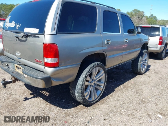 2001 GMC Yukon SLT with VIN 1GKEK13V11R220343, listed as a IAAI auction lot 41703786 with 213,518 mi miles. Bid and sale history available at carsss.com. Image 6.