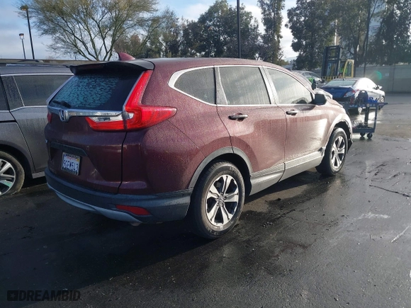 2019 Honda CR-V LX with VIN 2HKRW5H31KH415531, listed as a IAAI auction lot 41769399 with 79,584 mi miles. Bid and sale history available at carsss.com. Image 4.