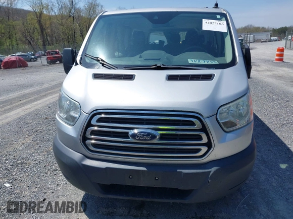 2016 Ford Transit Wagon XL with VIN 1FBZX2ZM8GKA69218, listed as a IAAI auction lot 42027106 with 311,419 mi miles. Bid and sale history available at carsss.com. Image 12.