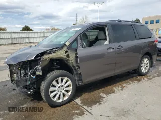 2012 Toyota Sienna LE with VIN 5TDJK3DC8CS047122, listed as a Copart auction lot 52036115 with 76,869 mi miles and Salvage Title. Bid and sale history available at carsss.com. Image 1.