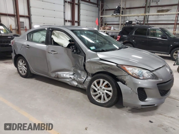 2012 Mazda 3 i Touring with VIN JM1BL1V77C1696219, listed as a IAAI auction lot 41944925 with 85,961 mi miles and . Bid and sale history available at DreamBid. Image 1.
