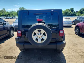 2013 Jeep Wrangler Sport with VIN 1C4AJWAG8DL693145, listed as a Copart auction lot 65591835 with 93,313 mi miles and Salvage title. Bid and sale history available at DreamBid. Image 6.
