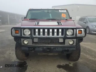2003 Hummer H2 with VIN 5GRGN23UX3H147490, listed as a Copart auction lot 82876424 with 241,737 mi miles and Clean Title. Bid and sale history available at carsss.com. Image 5.