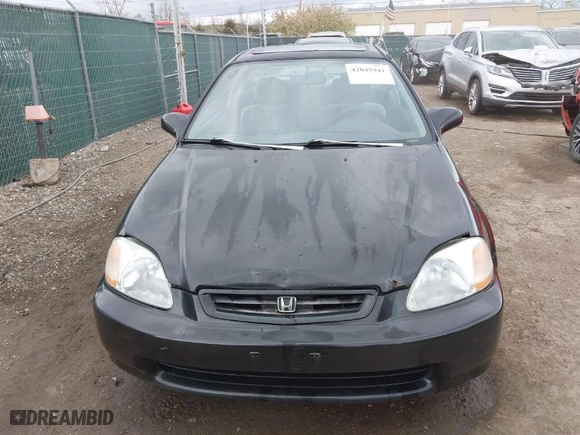 1997 Honda Civic EX with VIN 1HGEJ8242VL044722, listed as a IAAI auction lot 42045941 with 266,481 mi miles. Bid and sale history available at carsss.com. Image 12.