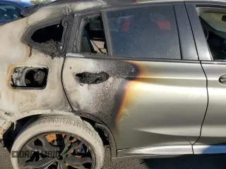 2020 BMW X4 M Competition z VIN 5YMUJ0C07LLA99617, wystawiony jako Copart lot #76339884 z przebiegiem Nie podano mil oraz Szkoda całkowita • Salvage title. Historia ofert i sprzedaży dostępna na DreamBid. Obrazek 11.