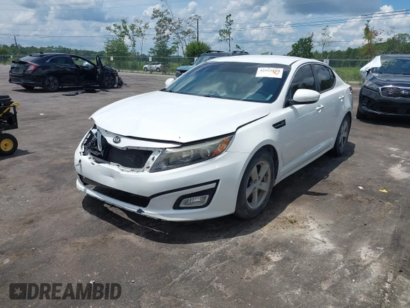 2015 Kia Optima LX with VIN KNAGM4A76F5639319, listed as a IAAI auction lot 42552130 with 207,006 mi miles and . Bid and sale history available at DreamBid. Image 2.