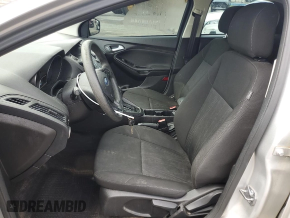 2017 Ford Focus SE with VIN 1FADP3F29HL242325, listed as a Copart auction lot 61153555 with 136,666 mi miles and Salvage title. Bid and sale history available at DreamBid. Image 7.