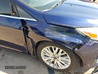 2017 Ford Focus Titanium with VIN 1FADP3J29HL204892, listed as a IAAI auction lot 42032705 with 119,028 mi miles and . Bid and sale history available at DreamBid. Image 6.