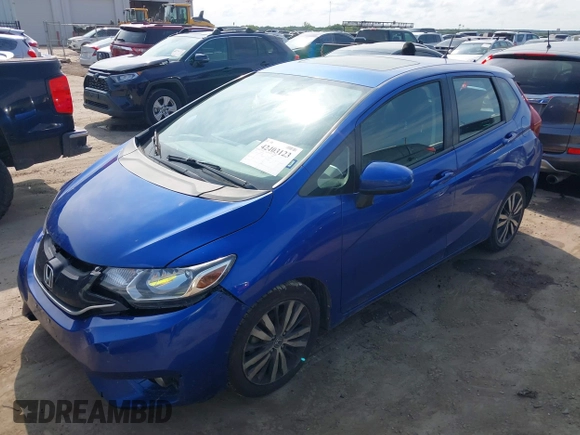 2015 Honda Fit EX-L z VIN 3HGGK5H89FM761083, wystawiony jako IAAI lot #42403123 z przebiegiem 132 543 mil mil oraz . Historia ofert i sprzedaży dostępna na DreamBid. Obrazek 17.