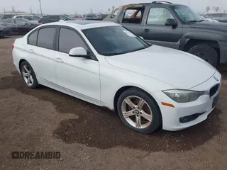 2012 BMW 3 Series 328i z VIN WBA3C1C53CF433151, wystawiony jako IAAI lot #41572717 z przebiegiem 103 101 mil mil oraz . Historia ofert i sprzedaży dostępna na DreamBid. Obrazek 1.