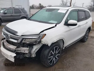 2021 Honda Pilot Touring 8-Passenger z VIN 5FNYF6H90MB031795, wystawiony jako IAAI lot #41207263 z przebiegiem 56 367 mil mil oraz . Historia ofert i sprzedaży dostępna na DreamBid. Obrazek 18.