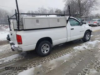 2002 Dodge 1500 with VIN 1D7HA16N72J250251, listed as a IAAI auction lot 41527456 with 218,870 mi miles and . Bid and sale history available at DreamBid. Image 4.