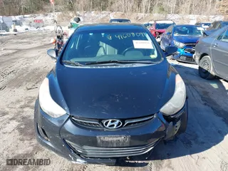 2013 Hyundai Elantra GLS PZEV with VIN KMHDH4AE4DU574977, listed as a IAAI auction lot 41608098 with 116,899 mi miles. Bid and sale history available at carsss.com. Image 13.