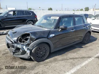 2021 MINI Hardtop 4 Door Cooper S z VIN WMWXU9C06M2N01629, wystawiony jako Copart lot #65398605 z przebiegiem 74 356 mil mil oraz Szkoda całkowita • Salvage title. Historia ofert i sprzedaży dostępna na DreamBid. Obrazek 1.