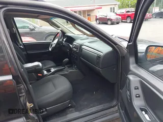 2004 Jeep Grand Cherokee Laredo with VIN 1J8GW48S94C357443, listed as a IAAI auction lot 42309958 with 176,738 mi miles and . Bid and sale history available at DreamBid. Image 5.