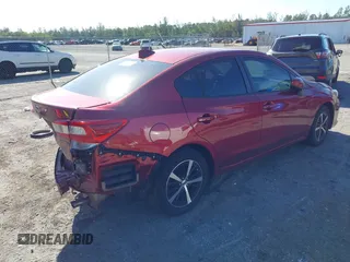 2022 Subaru Impreza Premium with VIN 4S3GKAD63N3606055, listed as a IAAI auction lot 41787174 with 37,512 mi miles and . Bid and sale history available at DreamBid. Image 4.
