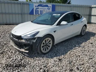 2023 Tesla Model 3 z VIN 5YJ3E1EA8PF449797, wystawiony jako Copart lot #64601115 z przebiegiem 99 771 mil mil oraz Czysty tytuł • Clean title. Historia ofert i sprzedaży dostępna na DreamBid. Obrazek 1.