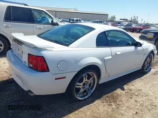 2002 Ford Mustang GT Deluxe with VIN 1FAFP42X22F128673, listed as a IAAI auction lot 41897080 with 137,379 mi miles. Bid and sale history available at carsss.com. Image 4.