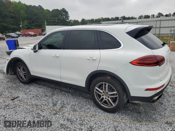 2016 Porsche Cayenne z VIN WP1AA2A25GLA10575, wystawiony jako Copart lot #56941595 z przebiegiem Nie podano mil oraz Szkoda całkowita • Salvage title. Historia ofert i sprzedaży dostępna na DreamBid. Obrazek 2.