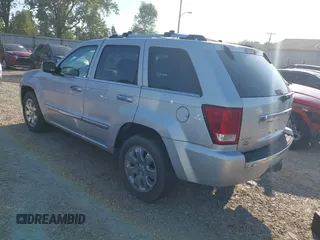 2008 Jeep Grand Cherokee Overland with VIN 1J8HR68M68C242958, listed as a IAAI auction lot 42820206 with 214,472 mi miles and . Bid and sale history available at DreamBid. Image 3.