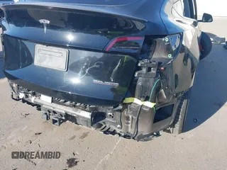 2022 Tesla Model Y Performance with VIN 7SAYGDEF0NF447541, listed as a IAAI auction lot 41762592 with 41,204 mi miles and . Bid and sale history available at DreamBid. Image 20.