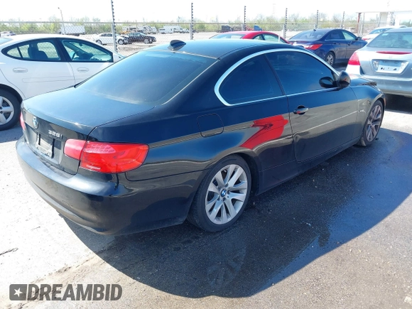 2012 BMW 3 Series 328i with VIN WBAKE5C53CE755694, listed as a IAAI auction lot 38869857 with 148,595 mi miles and . Bid and sale history available at carsss.com. Image 4.