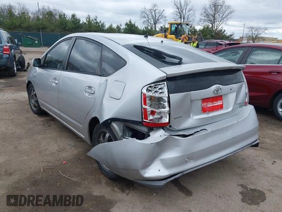 2007 Toyota Prius z VIN JTDKB20U977666406, wystawiony jako IAAI lot #42081233 z przebiegiem Nie podano mil oraz . Historia ofert i sprzedaży dostępna na DreamBid. Obrazek 6.