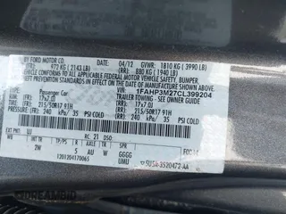 2012 Ford Focus SEL with VIN 1FAHP3M27CL399204, listed as a IAAI auction lot 41980976 with 113,443 mi miles. Bid and sale history available at carsss.com. Image 9.