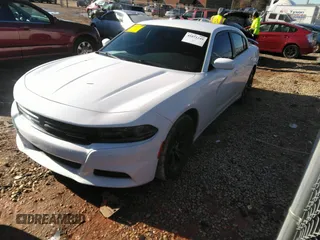 2015 Dodge Charger SXT with VIN 2C3CDXHG9FH870348, listed as a IAAI auction lot 41071249 with 81,972 mi miles and . Bid and sale history available at DreamBid. Image 2.