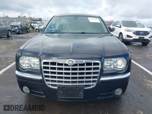 2006 Chrysler 300 C with VIN 2C3LK63H66H142437, listed as a IAAI auction lot 41751890 with 57,374 mi miles. Bid and sale history available at carsss.com. Image 12.