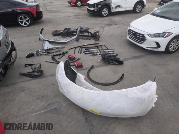 2023 Volkswagen Tiguan S with VIN 3VVFB7AXXPM103928, listed as a Copart auction lot 57119895 with 13,820 mi miles and Salvage title. Bid and sale history available at DreamBid. Image 13.