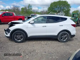 2018 Hyundai Santa Fe 2.4L z VIN 5NMZUDLB1JH101842, wystawiony jako IAAI lot #42302237 z przebiegiem 97 376 mil mil oraz . Historia ofert i sprzedaży dostępna na DreamBid. Obrazek 15.