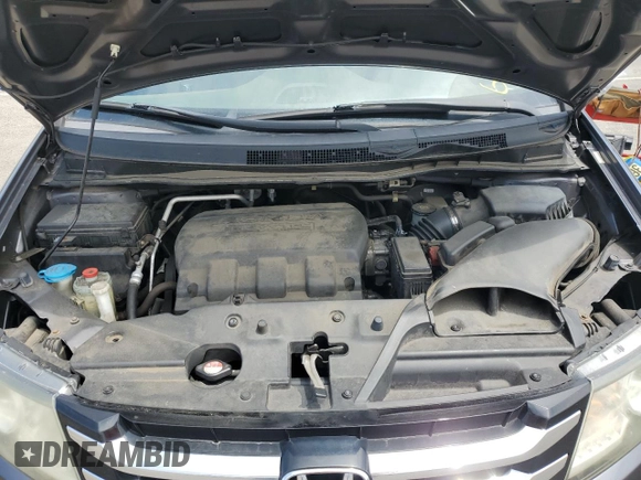 2014 Honda Odyssey EX-L with VIN 5FNRL5H68EB115720, listed as a Copart auction lot 62910725 with 132,254 mi miles and Clean title. Bid and sale history available at DreamBid. Image 12.