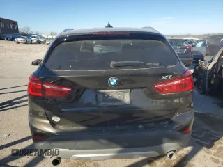 2016 BMW X1 xDrive28i with VIN WBXHT3C36GP880207, listed as a Copart auction lot 82597924 with 145,444 mi miles and Salvage Title. Bid and sale history available at carsss.com. Image 6.