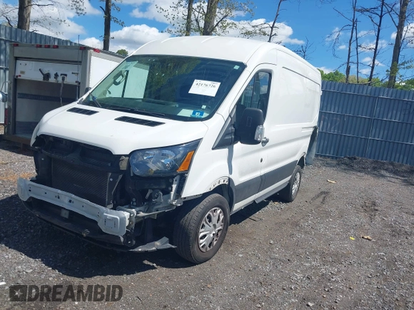 2020 Ford Transit Cargo z VIN 1FTBR1C8XLKA04894, wystawiony jako IAAI lot #42176726 z przebiegiem 84 154 mil mil oraz . Historia ofert i sprzedaży dostępna na DreamBid. Obrazek 17.