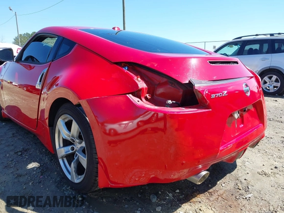 2009 Nissan 370Z Touring with VIN JN1AZ44E69M405179, listed as a IAAI auction lot 41762303 with 132,853 mi miles and . Bid and sale history available at DreamBid. Image 6.