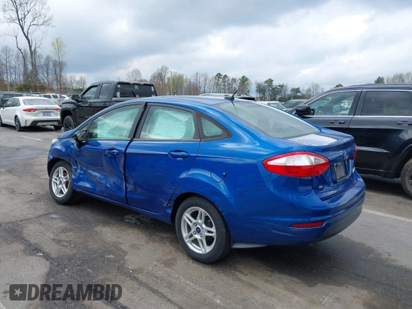 2019 Ford Fiesta SE with VIN 3FADP4BJXKM128486, listed as a IAAI auction lot 41876011 with 77,978 mi miles. Bid and sale history available at carsss.com. Image 3.