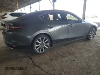 2021 Mazda 3 Premium with VIN JM1BPADL1M1305537, listed as a Copart auction lot 50722545 with 66,182 mi miles and Salvage title. Bid and sale history available at DreamBid. Image 3.
