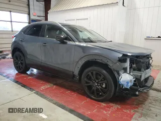 2023 Mazda CX-30 S Carbon Edition with VIN 3MVDMBCM3PM532381, listed as a Copart auction lot 51802905 with 39,536 mi miles and Clean Title. Bid and sale history available at DreamBid. Image 4.