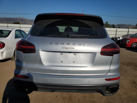 2018 Porsche Cayenne with VIN WP1AA2A21JKA05743, listed as a Copart auction lot 42643605 with 76,927 mi miles and Salvage Title. Bid and sale history available at carsss.com. Image 6.