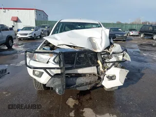 2014 Toyota Tacoma with VIN 3TMLU4ENXEM134872, listed as a IAAI auction lot 41303669 with 167,548 mi miles. Bid and sale history available at carsss.com. Image 13.