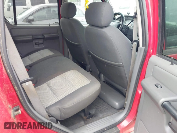2005 Ford Explorer Sport Trac XLS z VIN 1FMZU67K75UA17668, wystawiony jako IAAI lot #42496291 z przebiegiem 246 269 mil mil oraz . Historia ofert i sprzedaży dostępna na DreamBid. Obrazek 8.