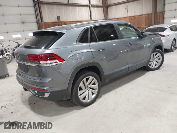 2022 Volkswagen Atlas SE z VIN 1V2KE2CA1NC206765, wystawiony jako IAAI lot #41876747 z przebiegiem 83 304 mil mil oraz . Historia ofert i sprzedaży dostępna na DreamBid. Obrazek 4.