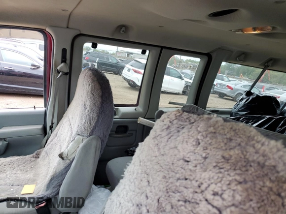 2005 Ford Econoline Passenger XL with VIN 1FBNE31L45HA98769, listed as a Copart auction lot 72427824 with 94,304 mi miles and Salvage Title. Bid and sale history available at DreamBid. Image 11.