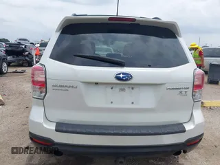 2014 Subaru Forester XT Touring with VIN JF2SJGMC4EH555465, listed as a IAAI auction lot 42357371 with 168,378 mi miles and . Bid and sale history available at DreamBid. Image 17.