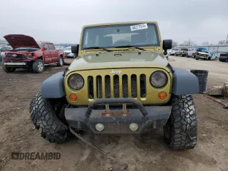 2007 Jeep Wrangler Unlimited Rubicon с VIN 1J4GA691X7L145737, выставлен на аукционе Copart как лот 86277914 с пробегом 285 624 миль миль и Списание • Salvage title. История ставок и продаж доступна на DreamBid. Изображение 5.