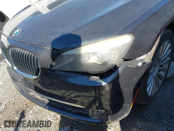 2012 BMW 7 Series 750Li xDrive with VIN WBAKC8C55CC436123, listed as a IAAI auction lot 41779443 with 126,618 mi miles and . Bid and sale history available at DreamBid. Image 13.