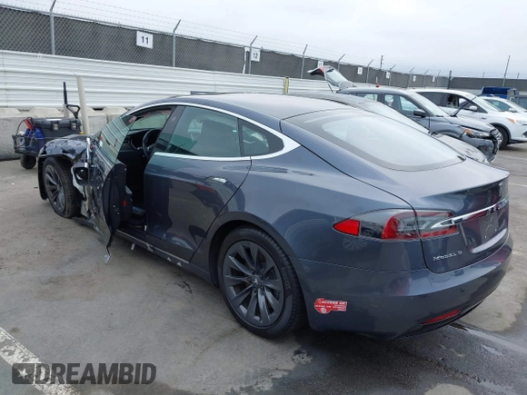 2017 Tesla Model S 100D with VIN 5YJSA1E20HF228681, listed as a IAAI auction lot 42424793 with Not provided miles and . Bid and sale history available at DreamBid. Image 3.